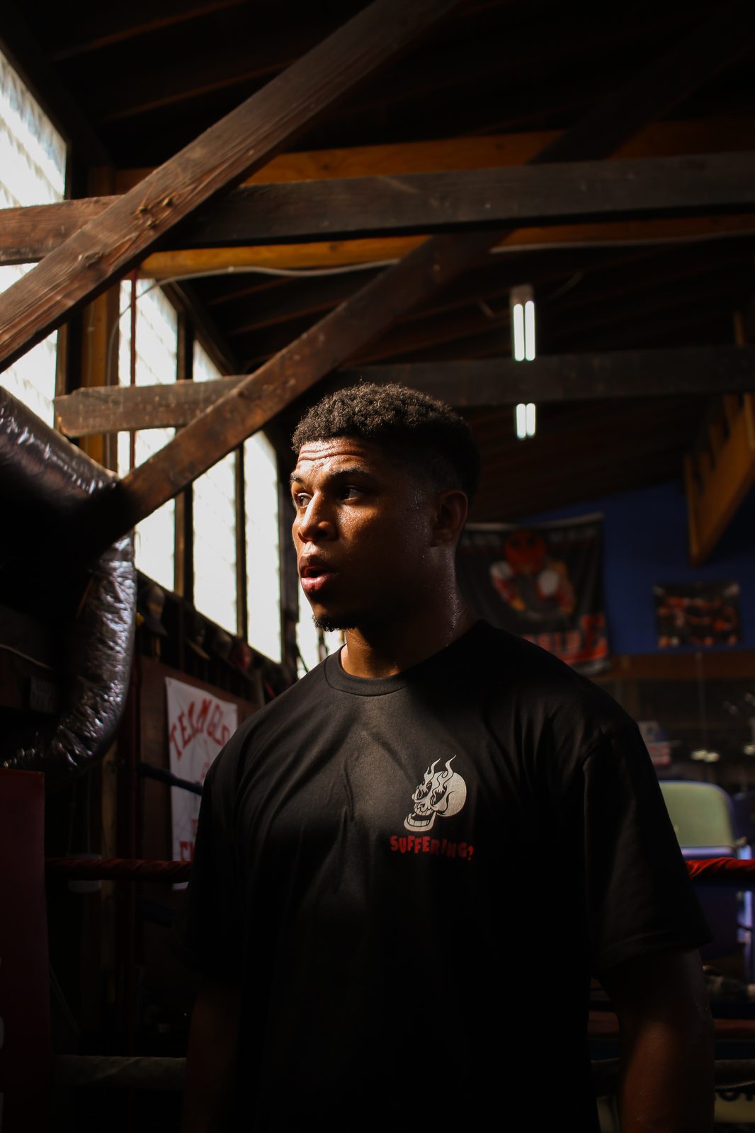 Cody Brooks in the gym, backlit
